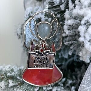 Stained glass Angel ornament holding a sign that says “Most Loved Aunt”